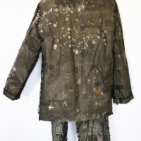 'Jacket/Pants'  • 5' x 3' • Newsprint, Thread, Wheat Paste, Yarn